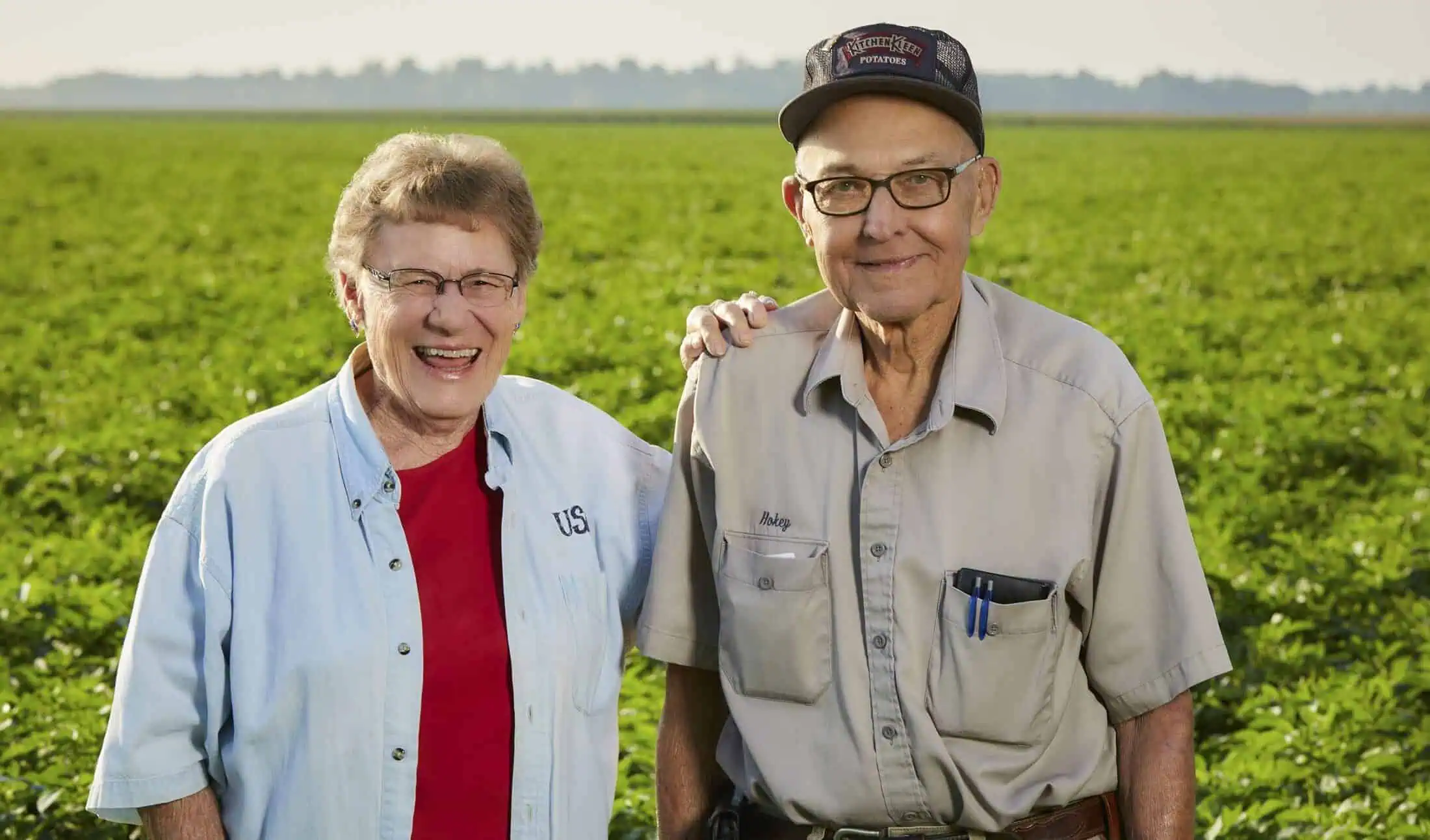 Nuto Farms grandparents standing in potato field