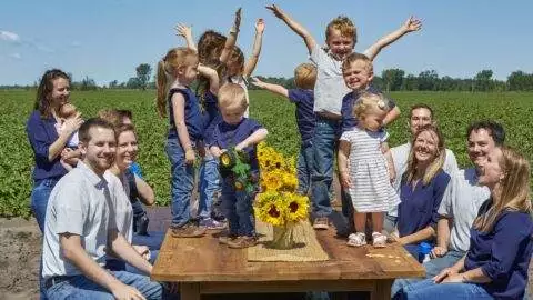 Wysocki Family of Companies family having fun at picnic table in the field