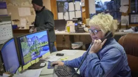 A & L Potato Co. - Judy taking a call at the front desk